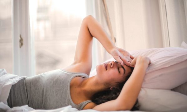 woman anxious bed