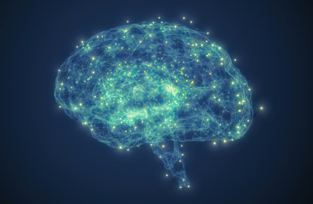 A digital illustration of a human brain made of interconnected glowing lines and dots, representing neural networks or artificial intelligence, on a dark blue background.