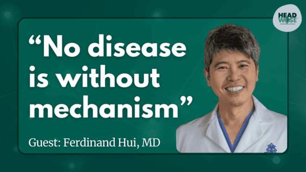 A smiling man in a white lab coat is shown next to the quote: 