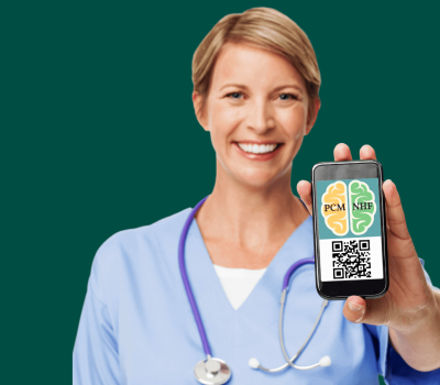 A smiling healthcare worker in scrubs holds up a smartphone displaying a QR code and two logos with text "PCM" and "NHP" on the screen.