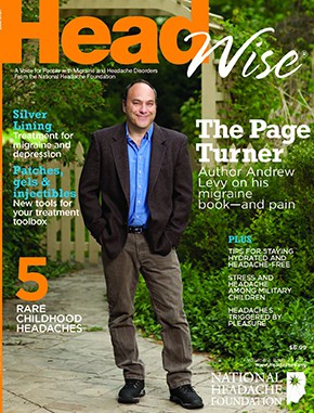 A man in a brown jacket and button-up shirt stands smiling on a garden path. The magazine cover reads, "HeadWise" and features articles on migraines and headaches.